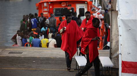 Spanish rescue service saves 84 migrants, finds 1 man dead on vessel close to the Canary Islands